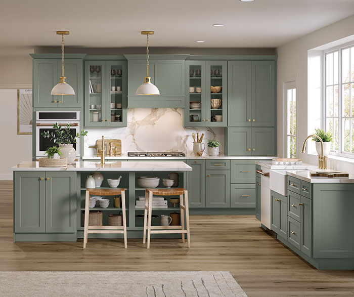 green kitchen cabinets and island