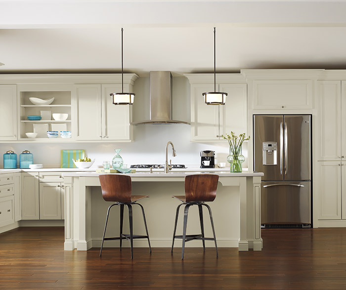kitchen featuring off white leeton cabinets and hardwood floors